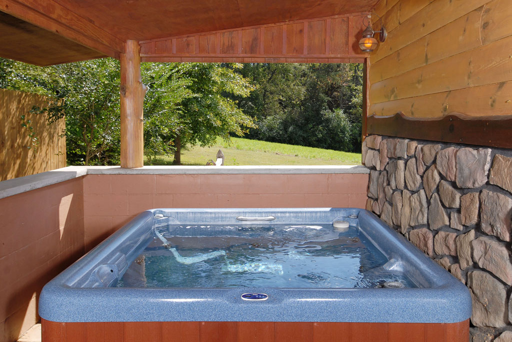 Tennessee Vacation Cabin Rental that features a private hot tub